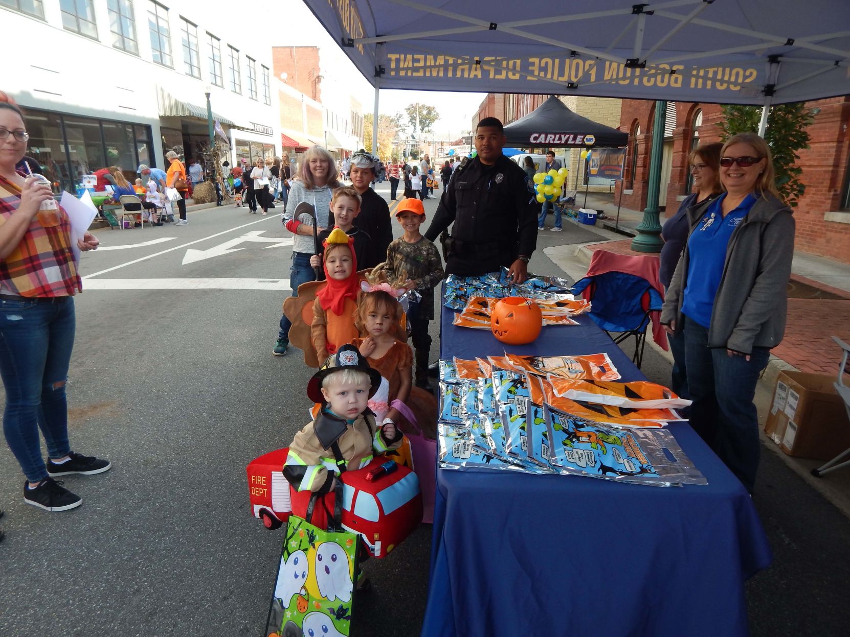 Children get candy from police